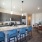 4 Blue Stools at Granite COuntertop Kitchen Island