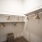 Empty Closet with Wooden Hangers